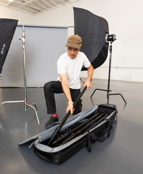 Internal straps hold stands firmly in place, and exterior compression straps collapse the case to the minimum size it needs to be. A deep pocket on the inside of the top cover protects umbrellas.