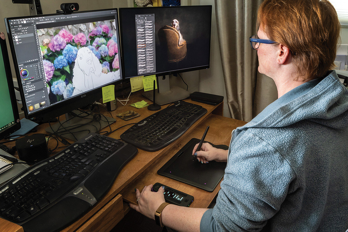 Photographer and painter Danica Barreau sits at her desk computer setup using the Xencelabs tablet and quick keys.