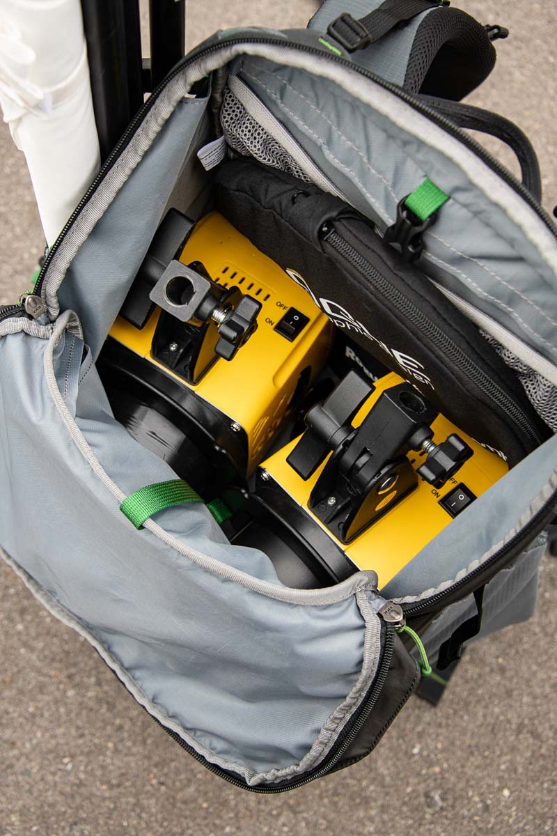 Top-down view of a  MindShift Rotation backpack showing lighting gear loaded inside it.