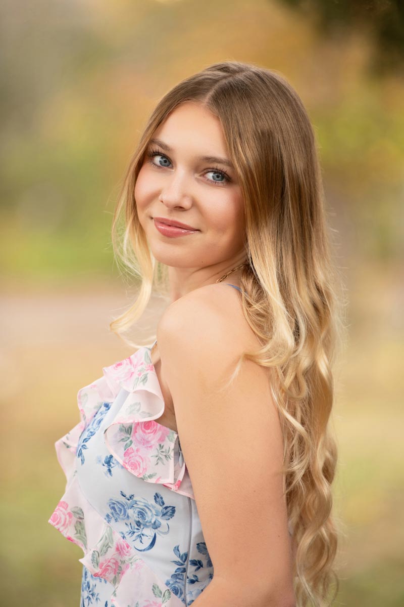 high school senior portrait by Kristina Carlson of a girl with long blond hair
