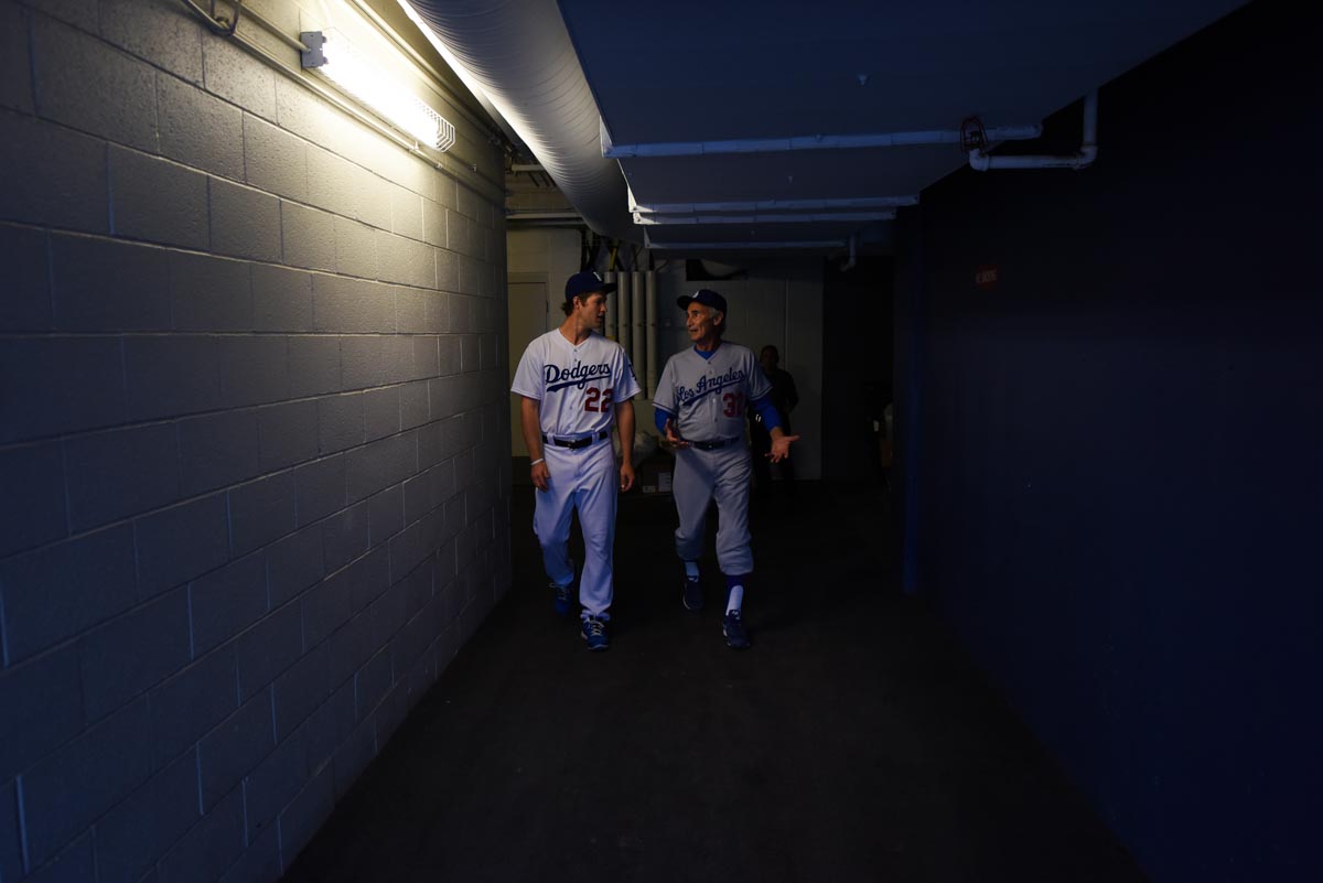 Sandy Koufax and Clayton Kershaw walking down hall