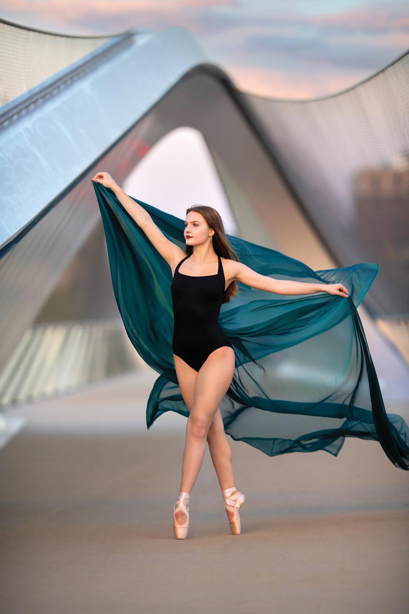 high school senior dancer on a bridge
