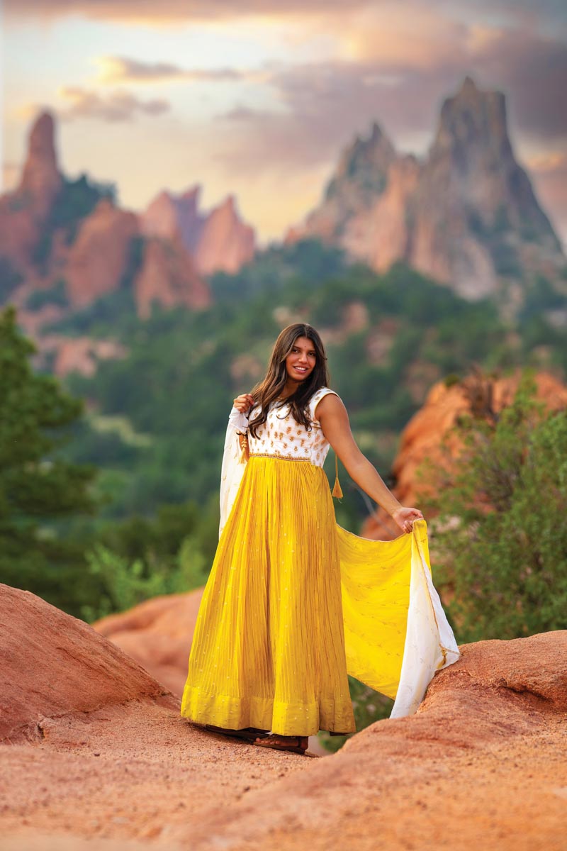 high school senior portrait girl in yellow dress at Garden of the Gods