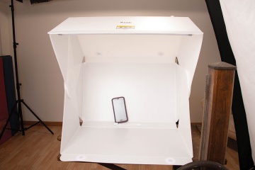 The Foldio3 is a 25x25-inch open-sided light box that folds flat when you need to put it away.