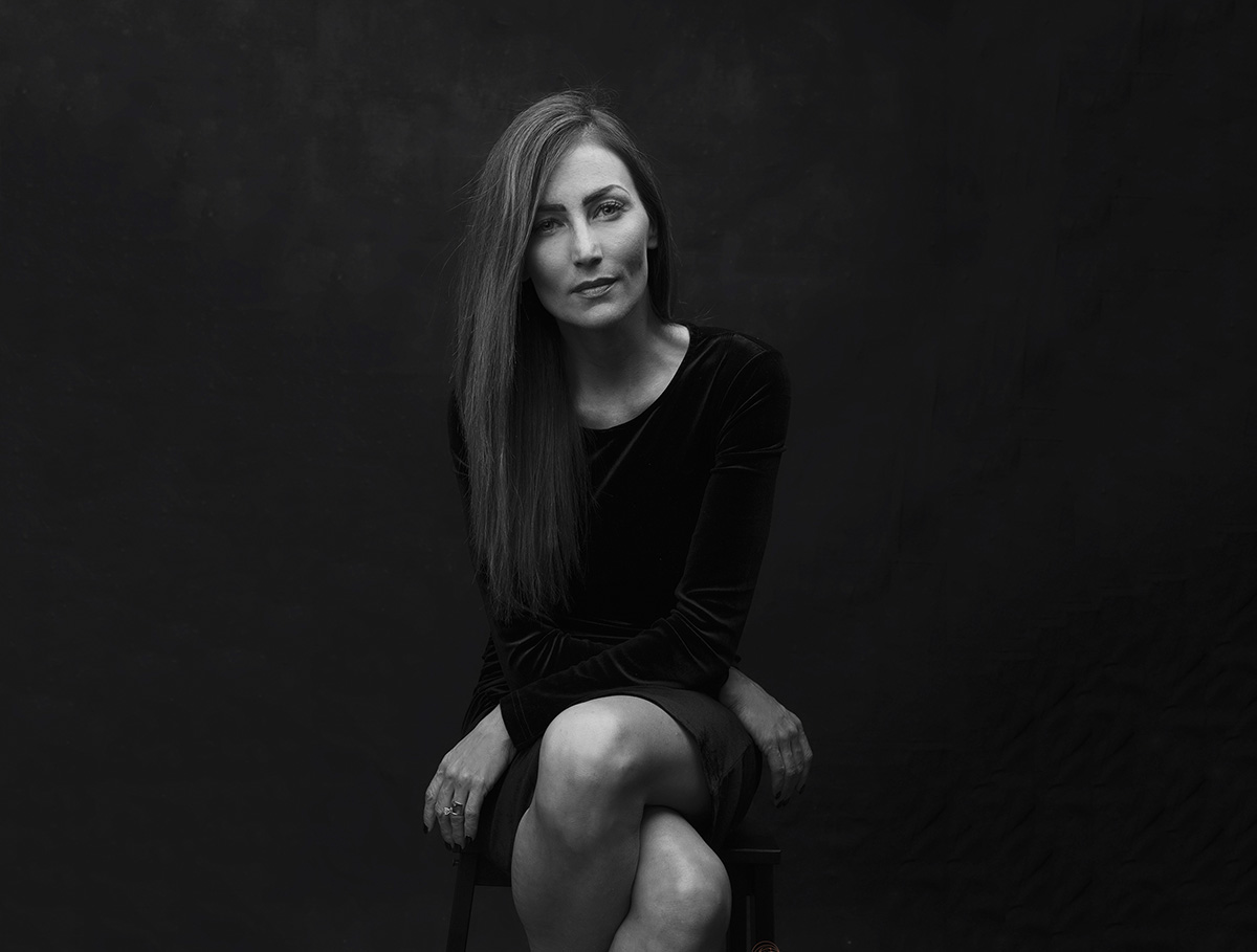 Black-and-white portrait of photographer Melody Smith