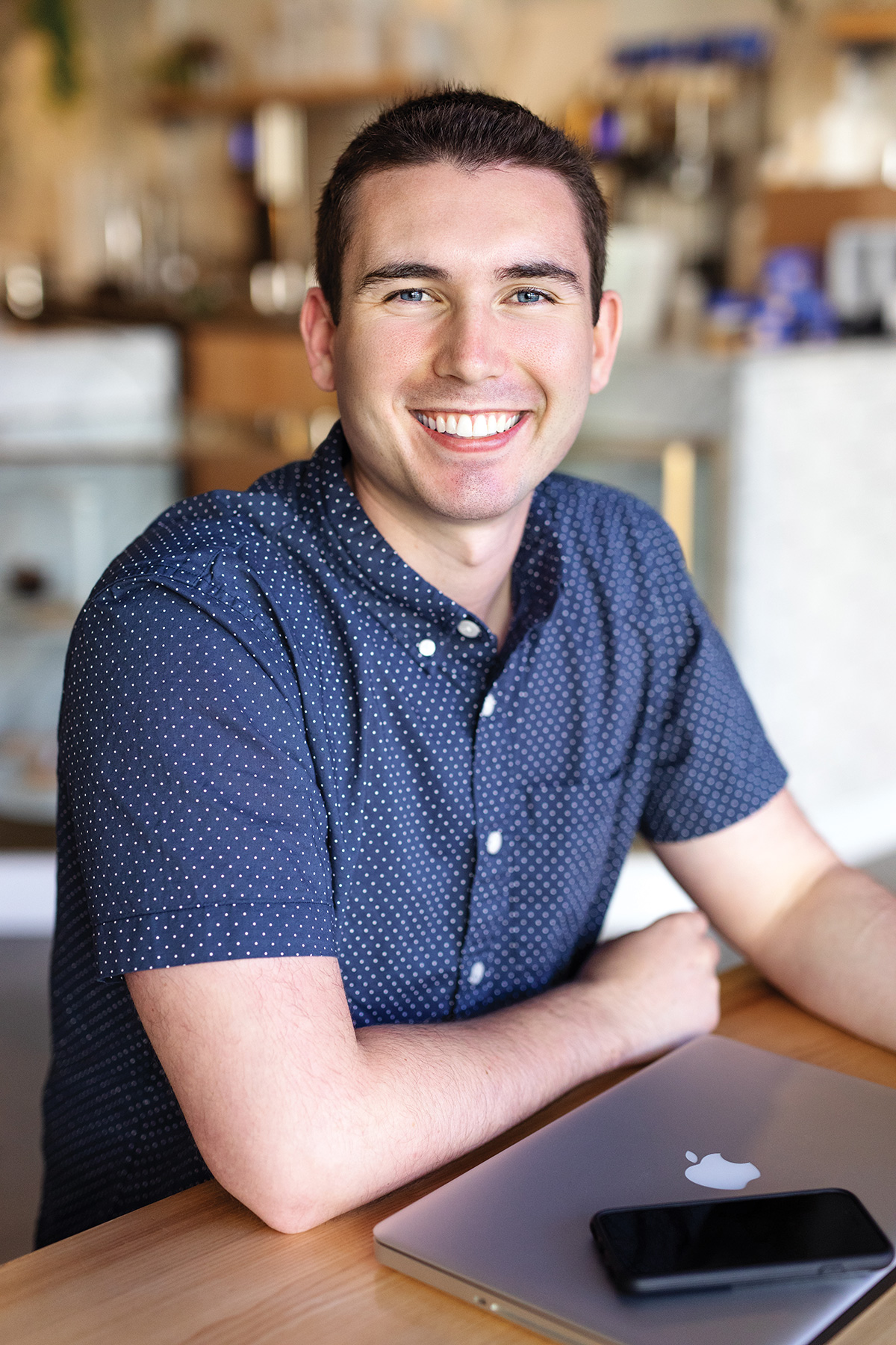 photographer sean brown as short dark hair and wears a blue shirt