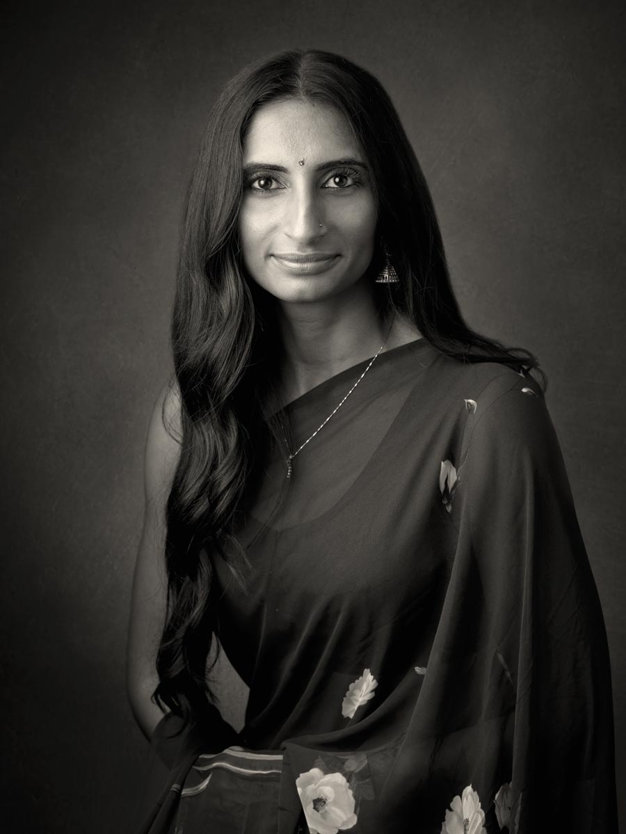 black-and-white portrait of a women wearing a sari